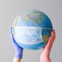 Globe with face mask