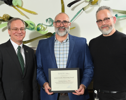 Nicolas Kanaan, PhD,  posed with dean Sousa and their department chair.