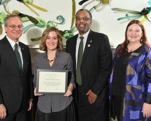 Robey Shah, PhD, MS, MPH,  posed with dean Sousa and their department chair.