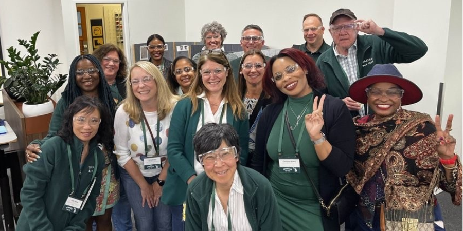 A group of participants from the Spartan Bus Tour.