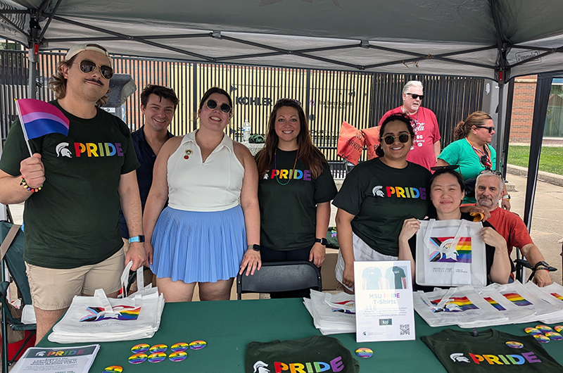 Volunteers at the Grand Rapids Pride Festival booth