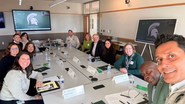 Dean Rayamajhi with the alumni board.