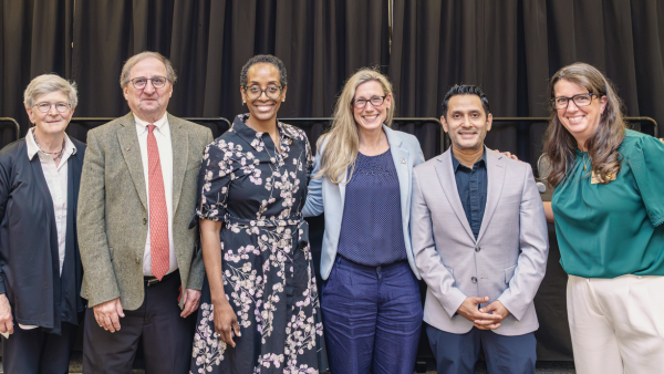 A group photo of the autism conference panel.