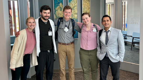 Dean Rayamajhi with some students at the U.P. campus.
