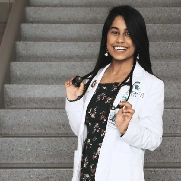 Antara in her white coat.