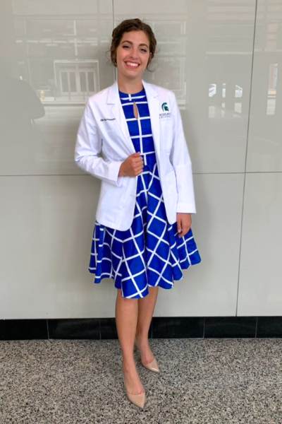 Ellie Gschwendtner in her white coat.