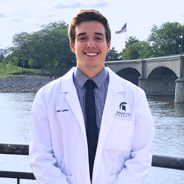 Nick LeMire in his white coat.