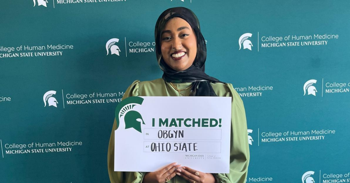 Nadiya Sharif holding her match day sign.