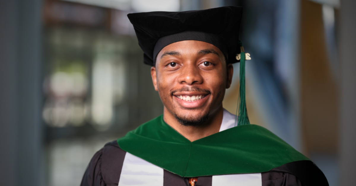 Frederick Ezenyilimba graduation headshot.