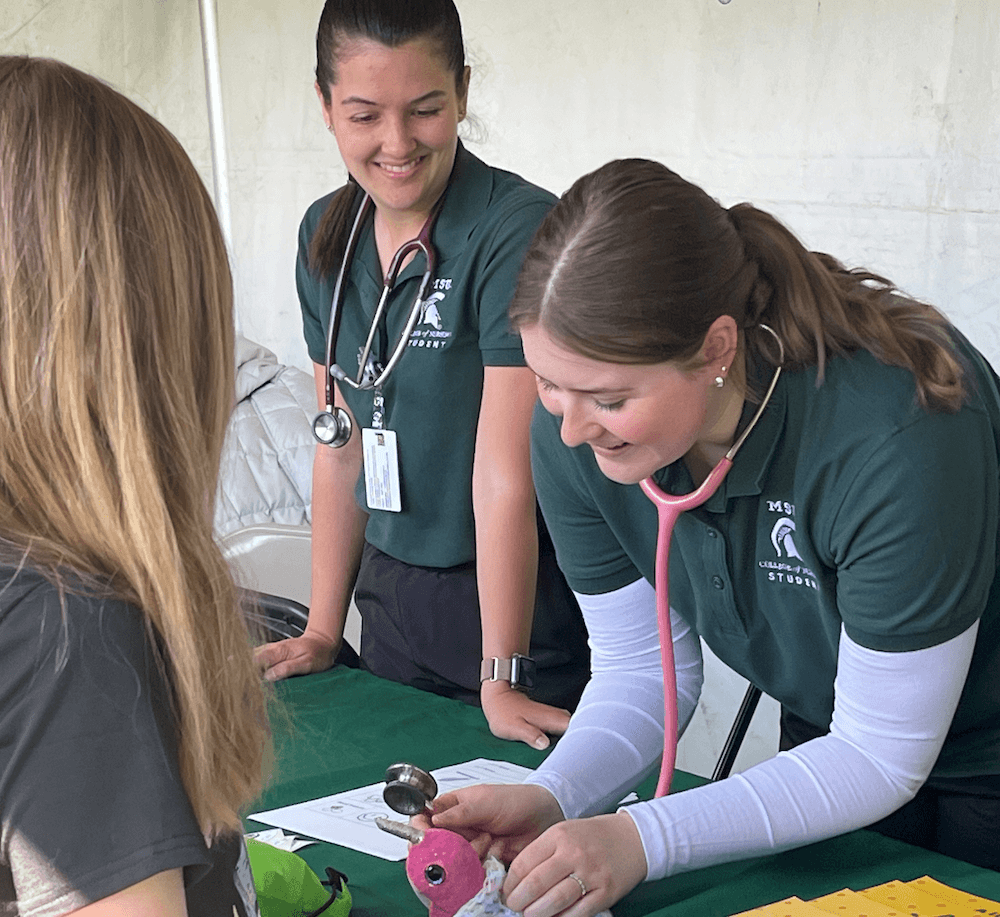 Michigan State University College of Nursing students Morgan Howell and Lily Campbell.