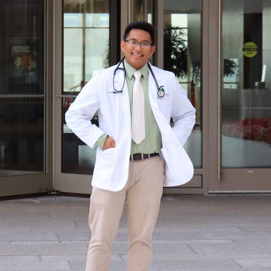 Medical student standing in front of Secchia Center