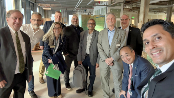 A group of CHM researchers with the dean and provost at the Research Center.