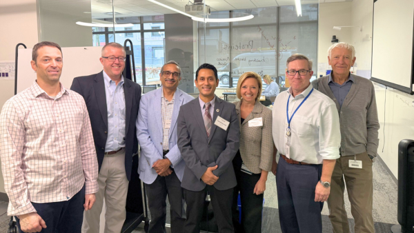 Dean Rayamajhi with research partners at the Van Andel Institute