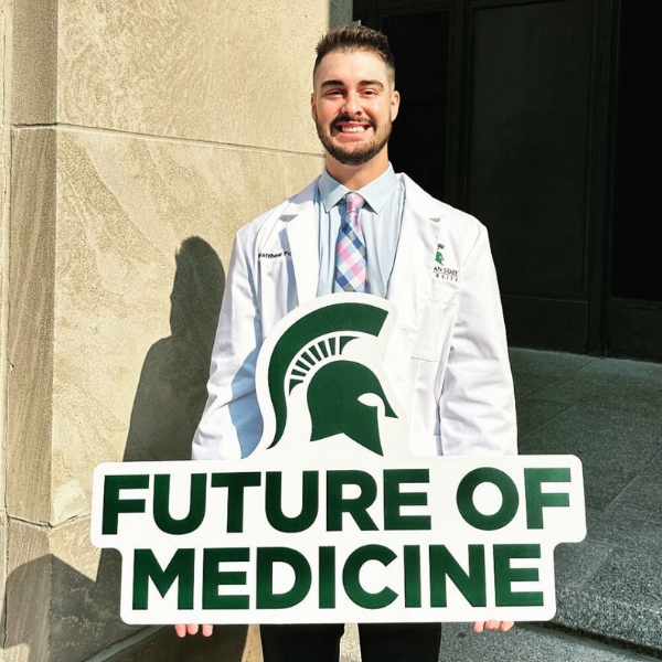 Matthew Foley in his whitecoat.